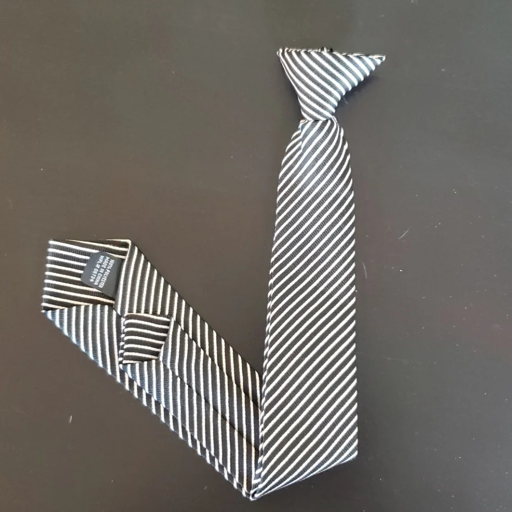 Boys black and white striped Polyeste clip on tie.